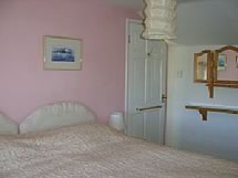 pink bedroom at the gables cottage